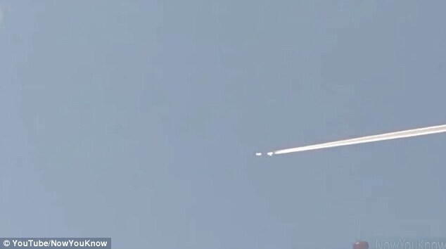 Bizarre footage of UFO speeds after passenger jet 2